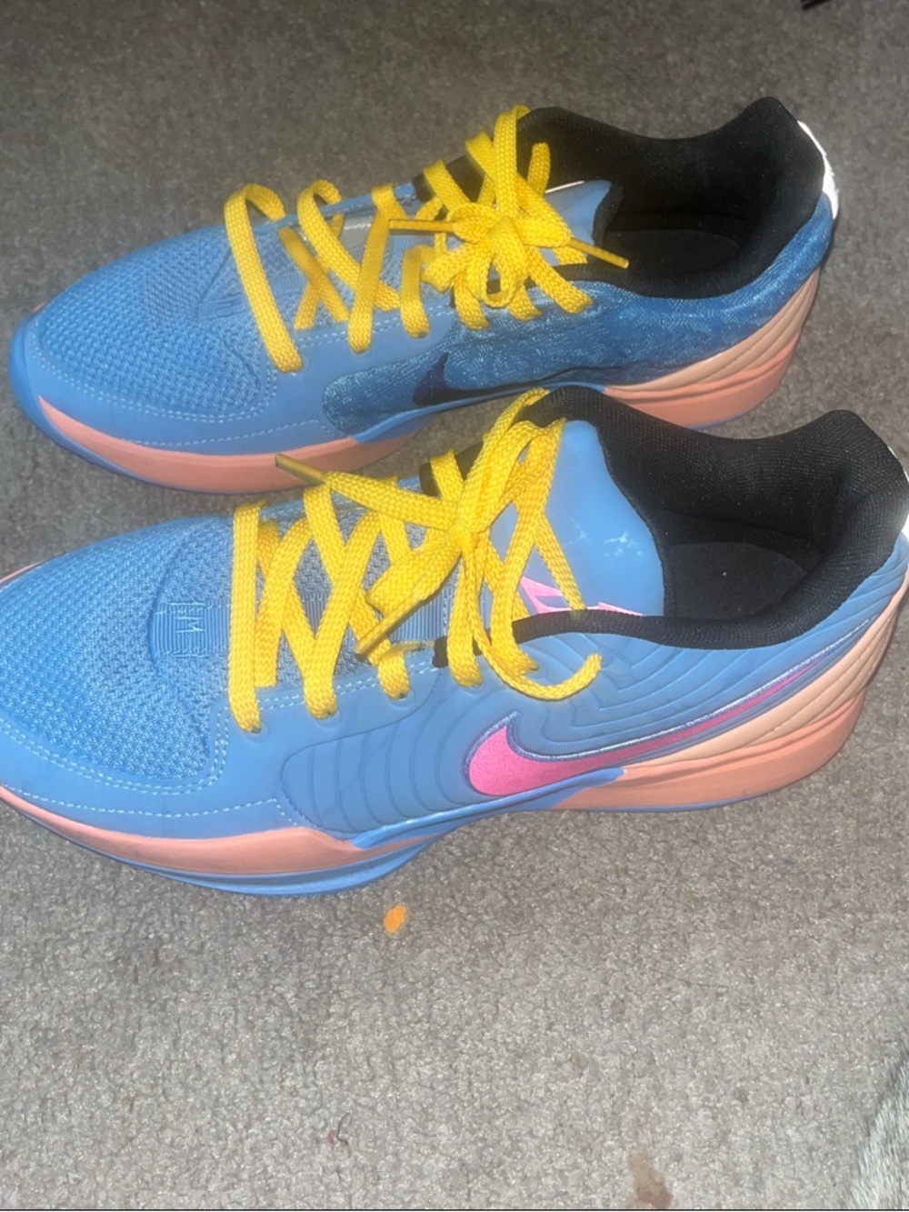 Nike Blue Sneakers with Pink Swoosh and Yellow Laces